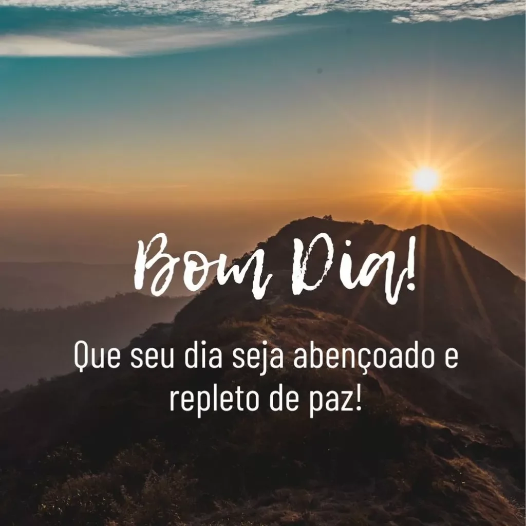 Paisagem montanhosa ao amanhecer com mensagem de bom dia e votos de paz.